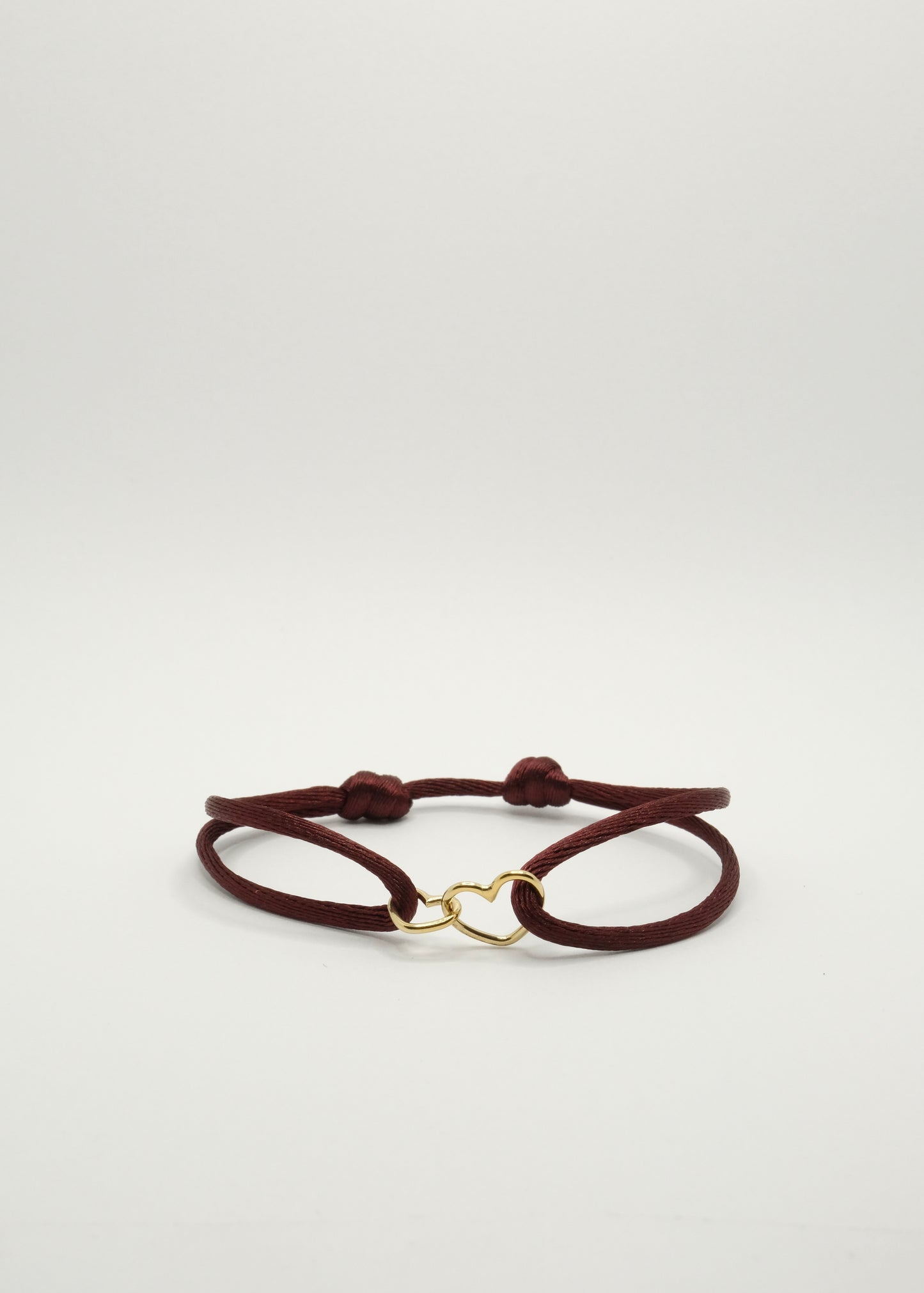 Bracelet sur cordon Cœurs entrelacés en argent rhodié et plaqué or