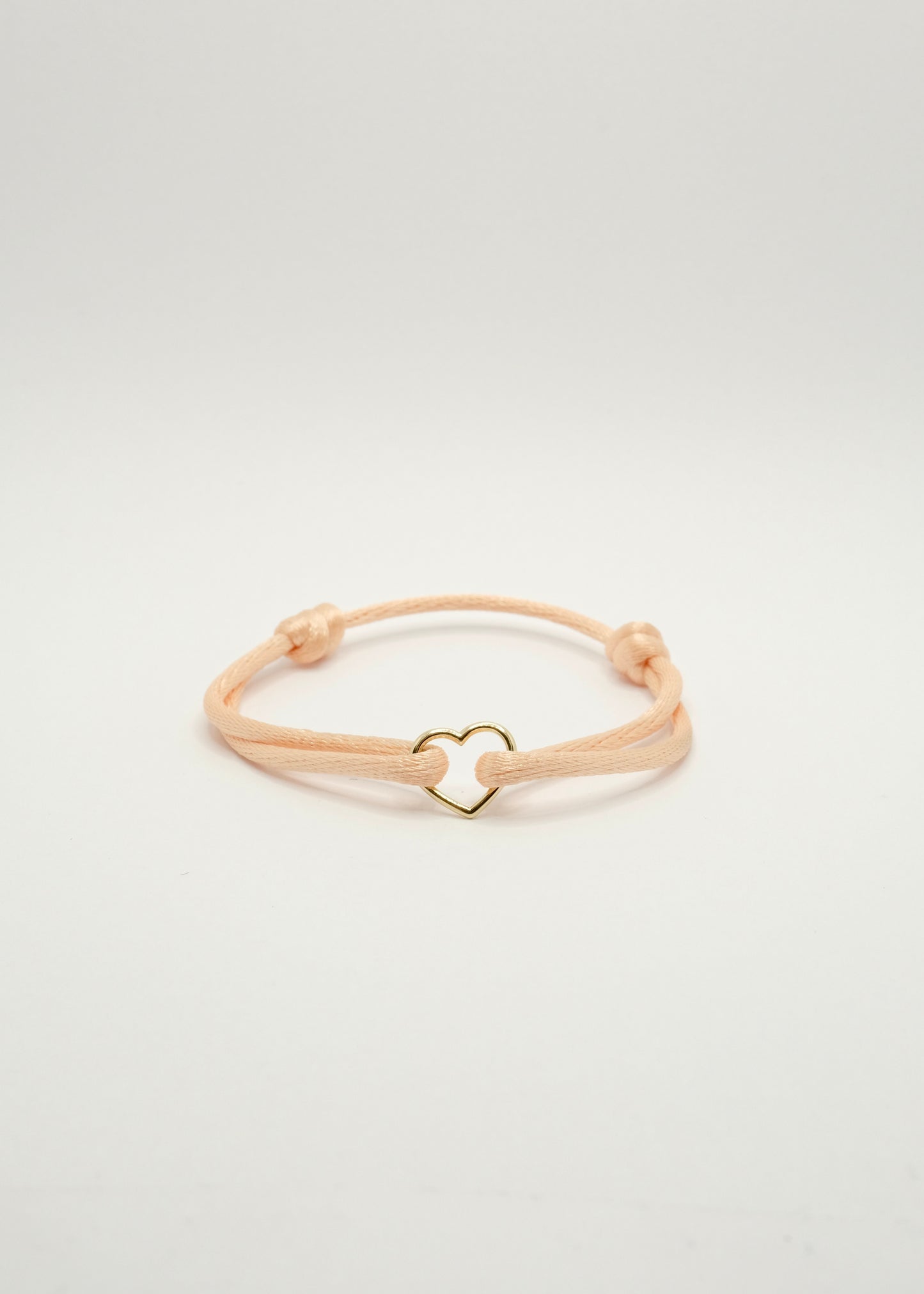 Bracelet sur cordon en forme de cœur en or