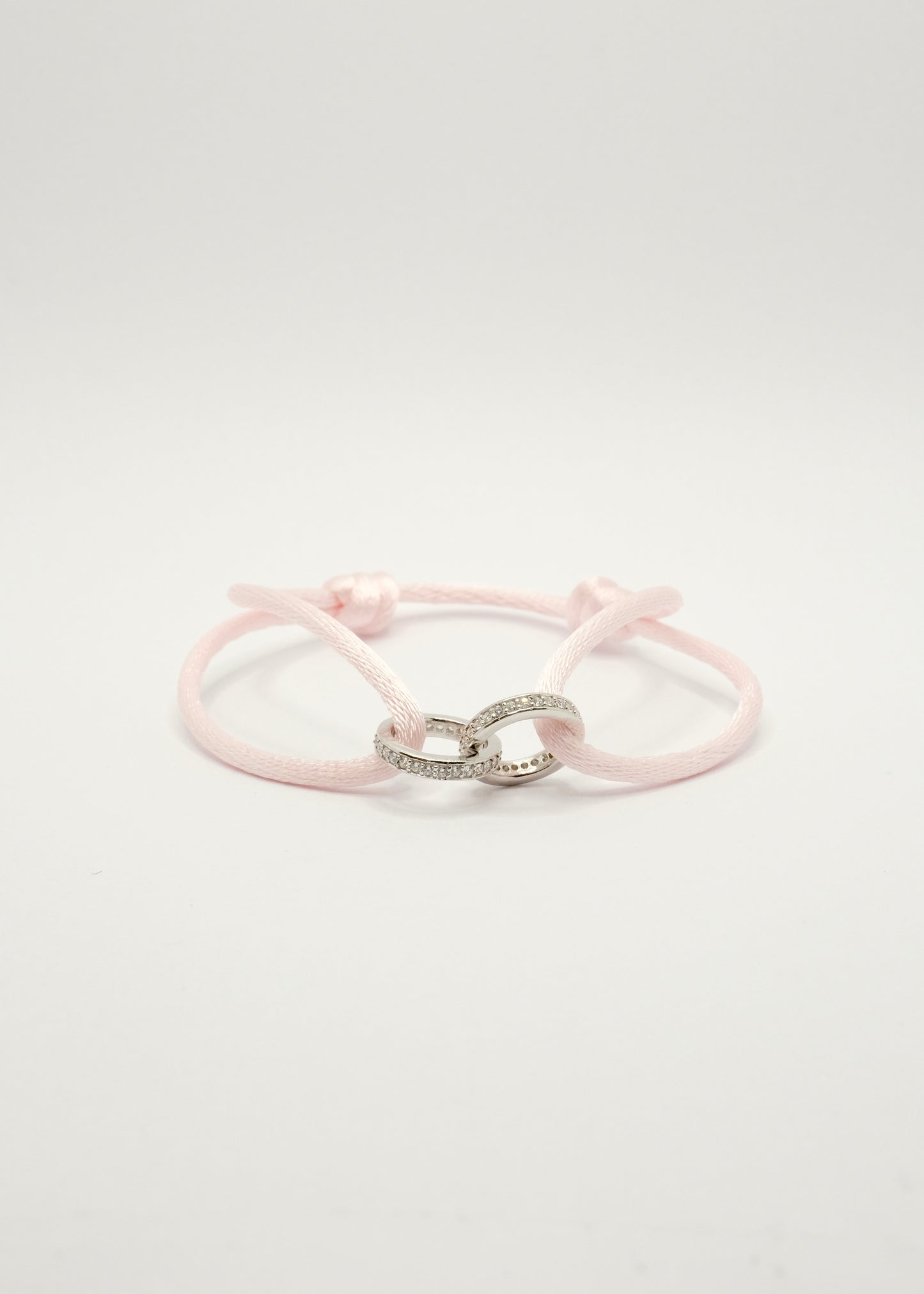 Bracelet sur cordon deux anneaux en argent rhodié