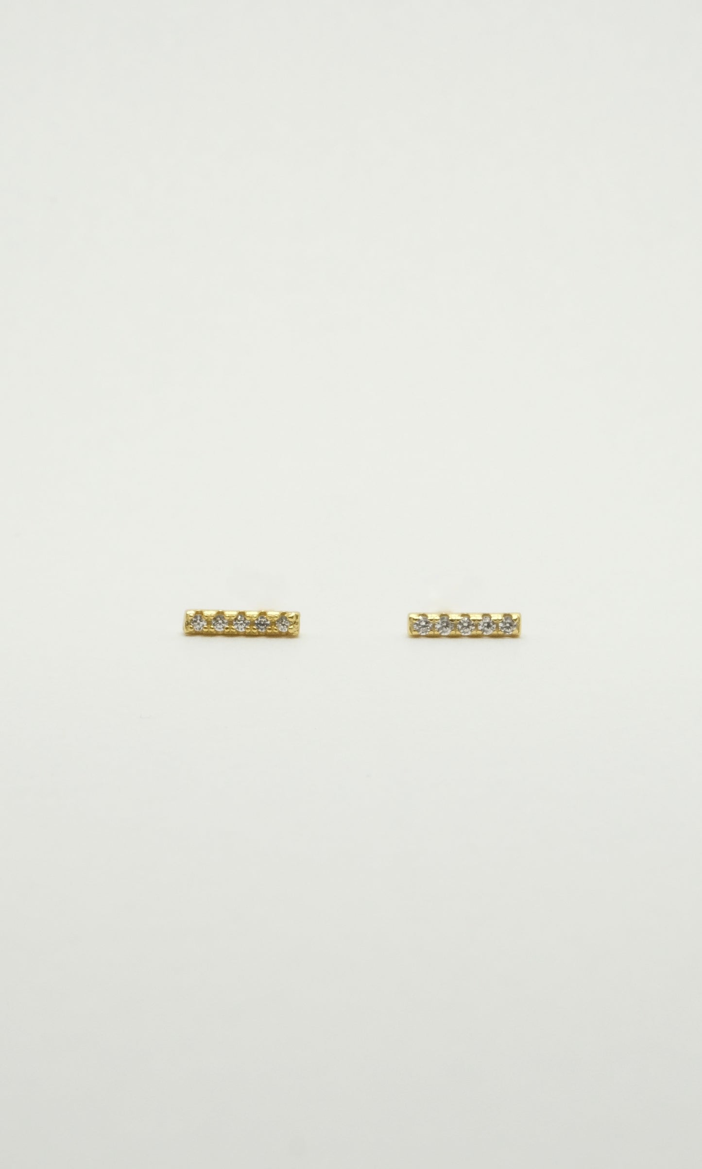 Clous d'oreilles en forme de rayon en argent et plaqué or