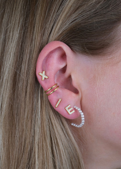 Clous d'oreilles en forme de rayon en argent et plaqué or