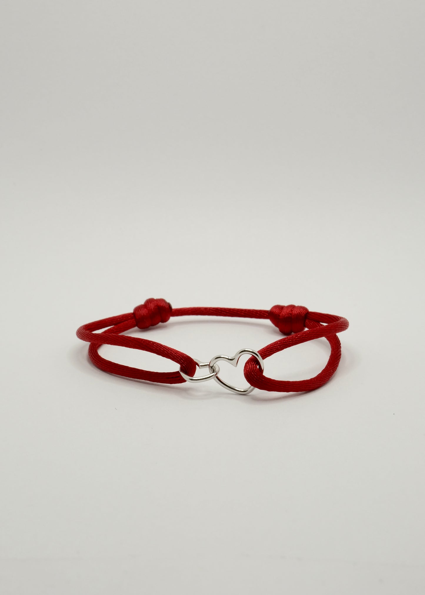 Bracelet sur cordon Cœurs entrelacés en argent rhodié et plaqué or